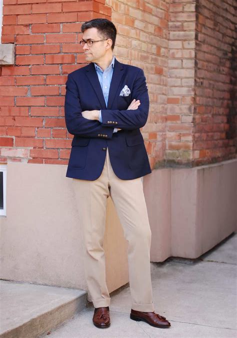 blue blazer and tan pants